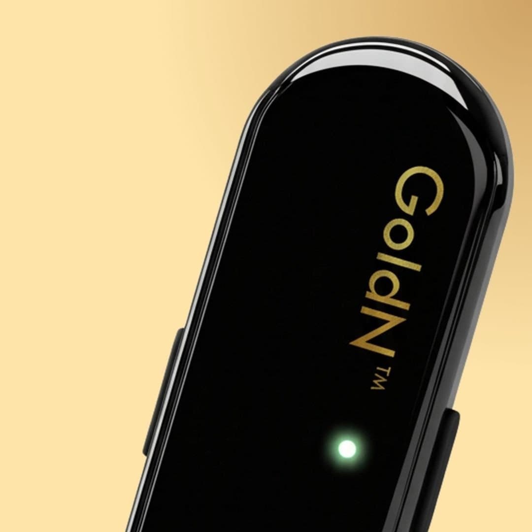 Close-up of the GoldN Companion on a warm gold background